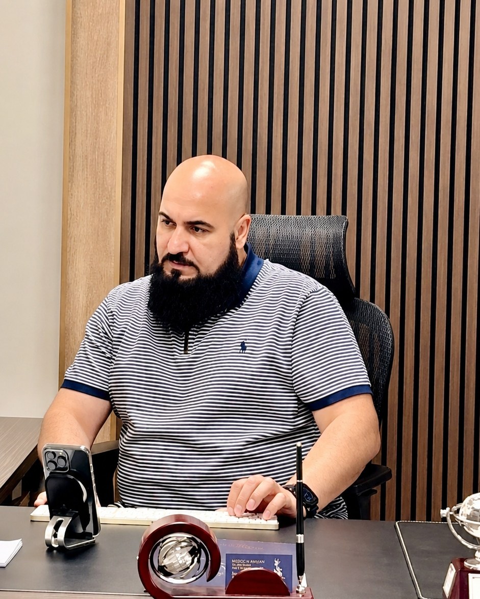 Salam Albadi at his desk in the Albadi Office